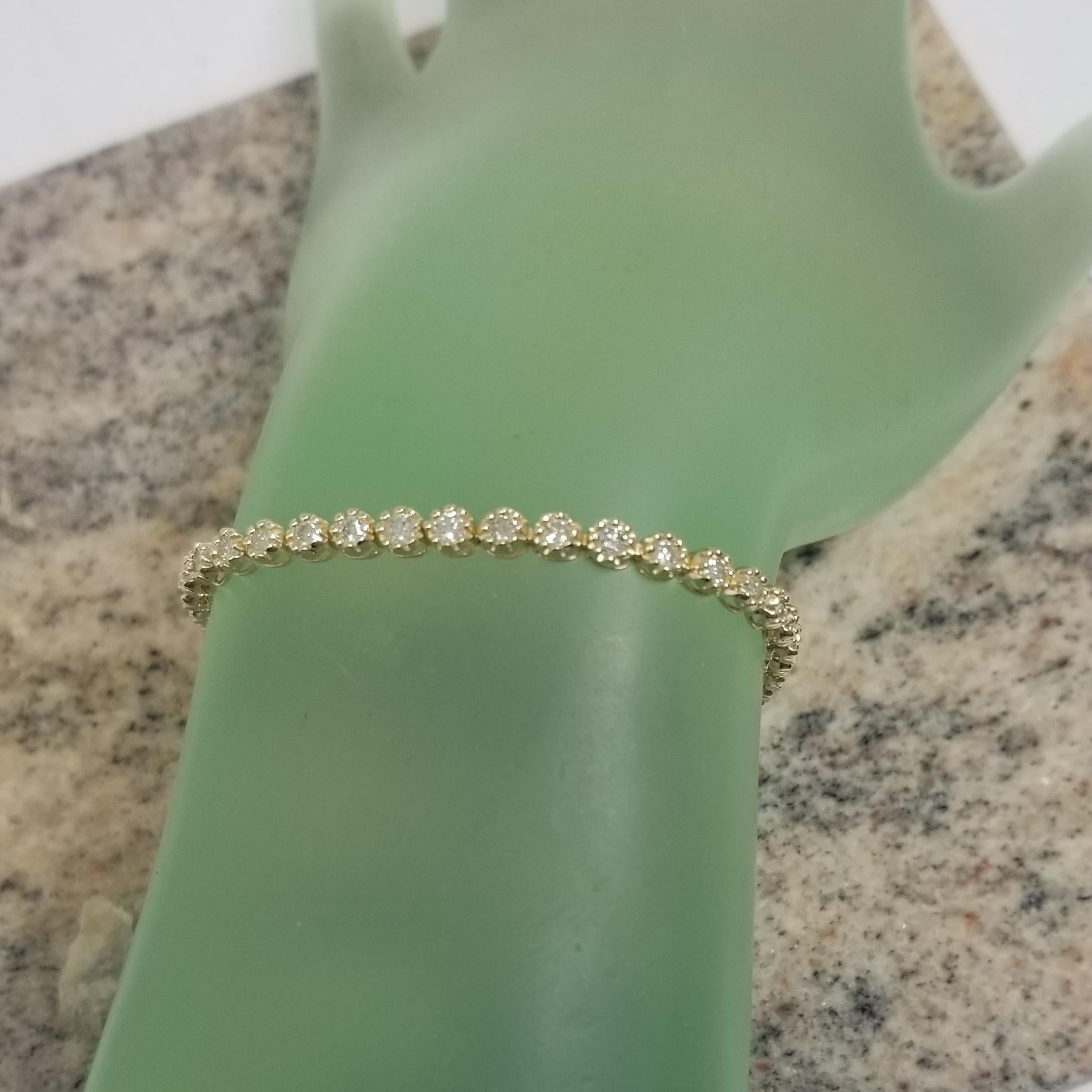 Women's or Men's 14k Yellow Gold Diamond Tennis Bracelet Set in an Bead Setting 3.02 Carats For Sale