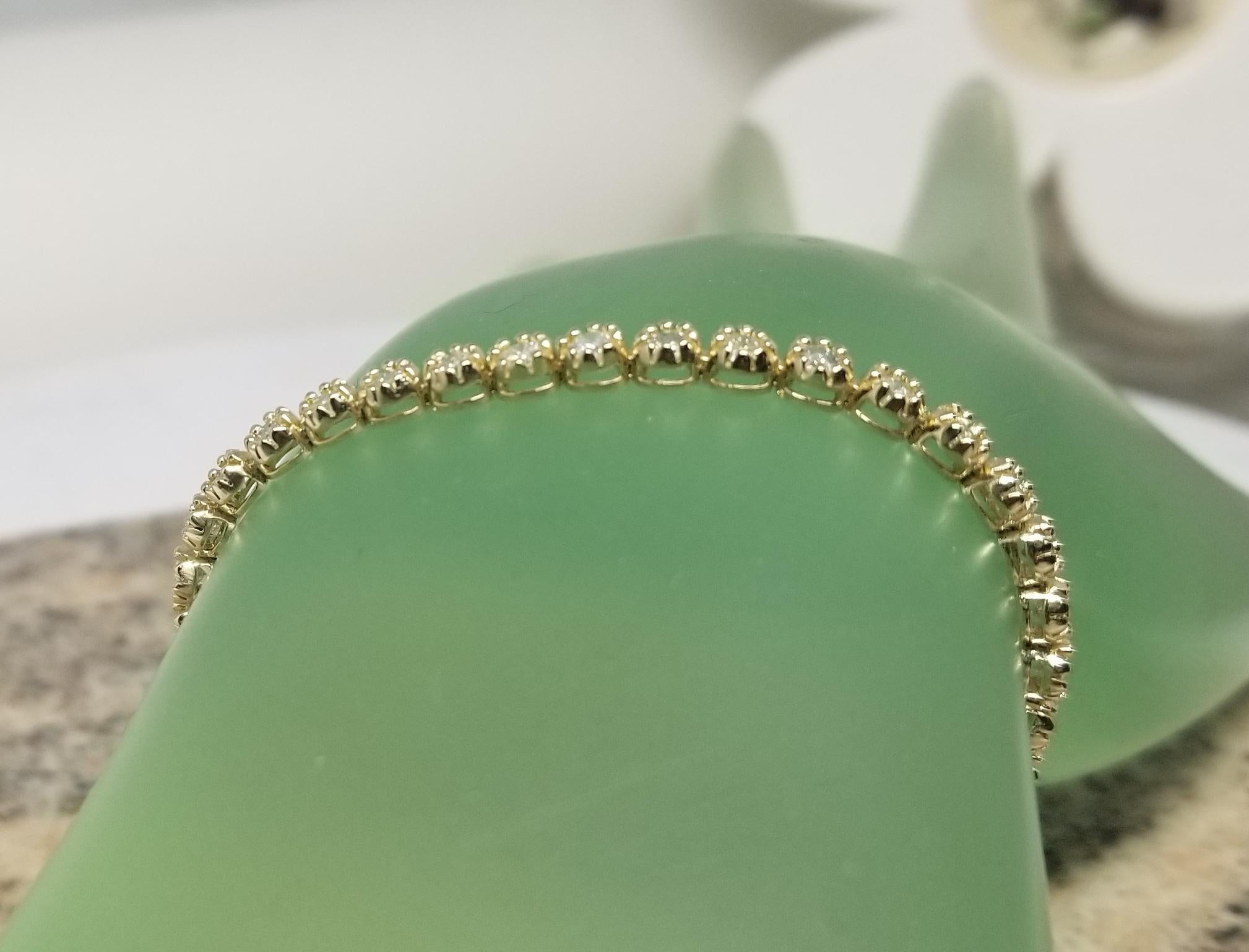 14k Yellow Gold Diamond Tennis Bracelet Set in an Bead Setting 3.02 Carats For Sale 1