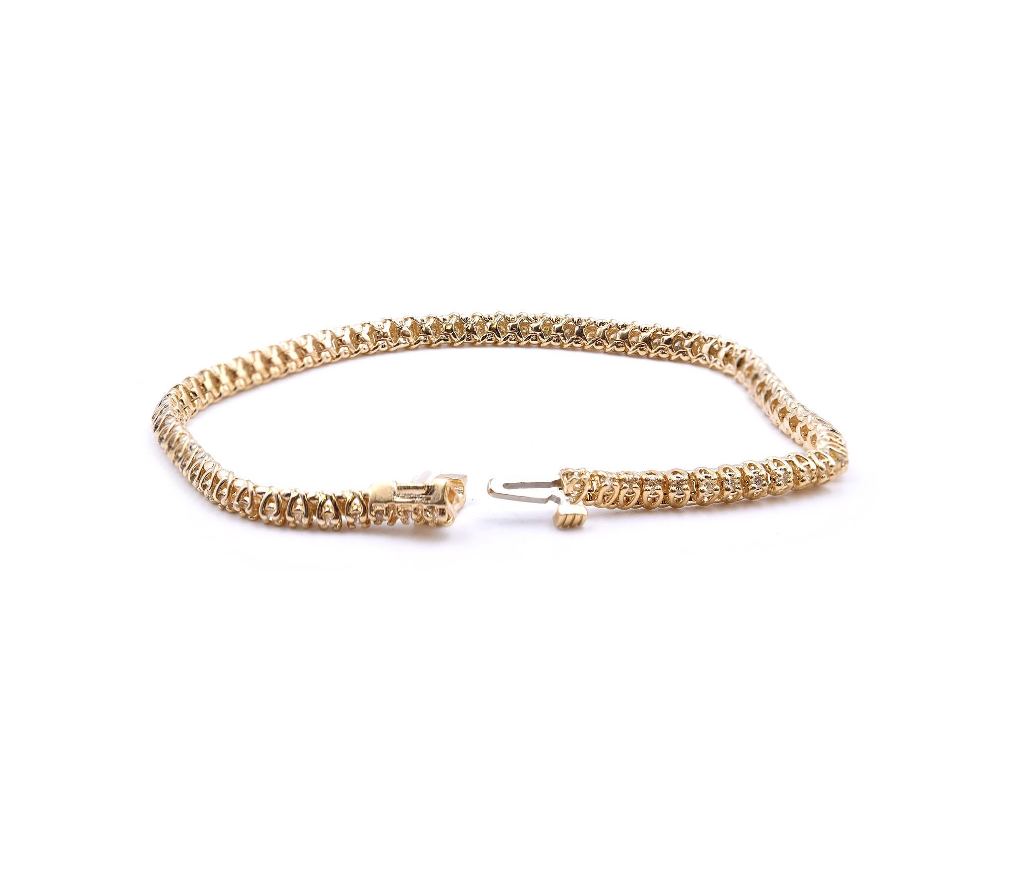 Designer: custom
Material: 14k yellow gold
Diamonds: 70d = 1.02cttw
Color: G
Clarity: SI1
Dimensions: bracelet is 7 inches long and measures 3.64mm in width
Weight: 10.25 grams
