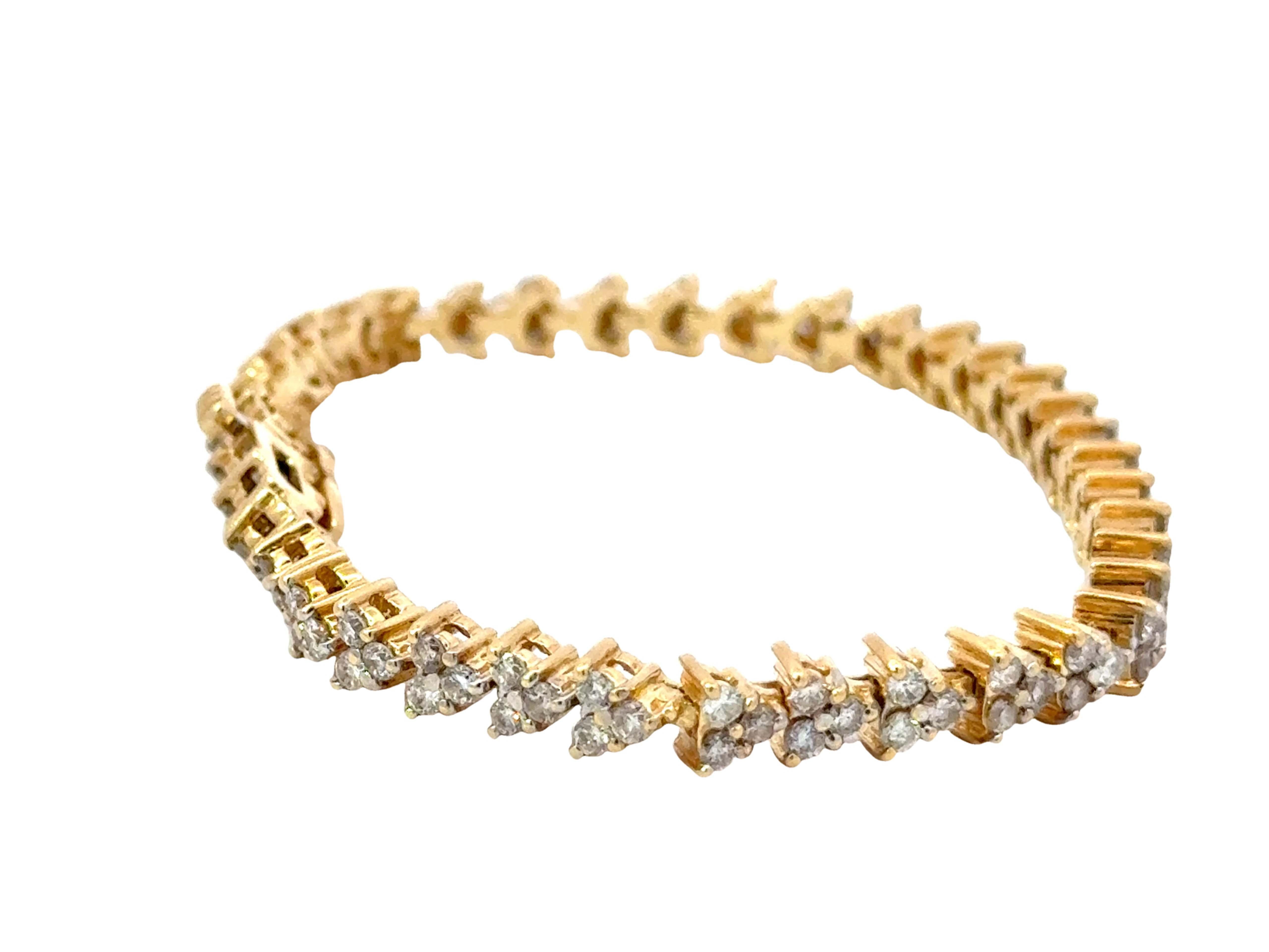 Modern 14k Yellow Gold Diamond Triangle Tennis Bracelet For Sale