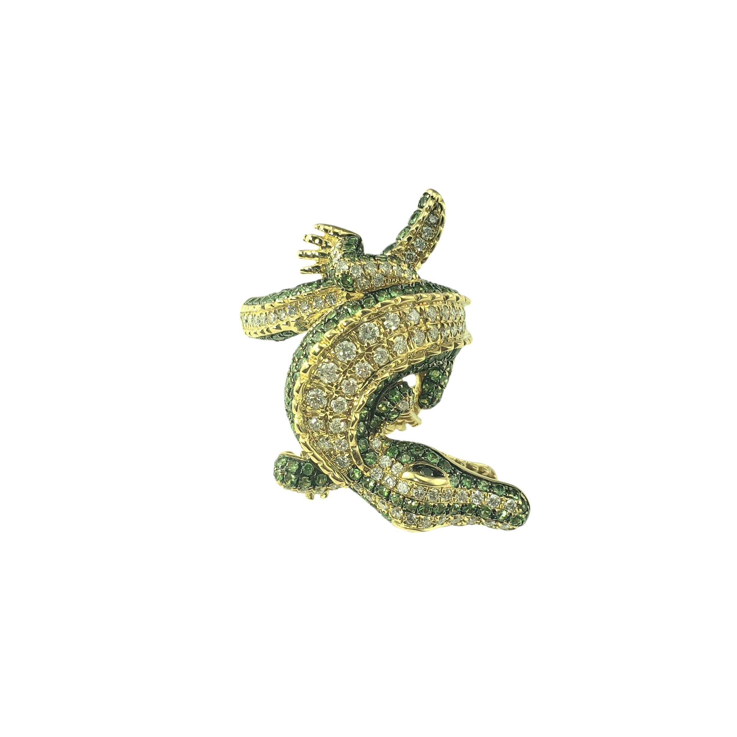 Bague en or jaune 14K diamant et grenat tsavorite taille 7 JAGi Certified-

Faites-vous remarquer avec cette éblouissante bague en or jaune 14 carats en forme d'alligator. Le design ardent et enroulé s'enroule de façon spectaculaire autour du doigt