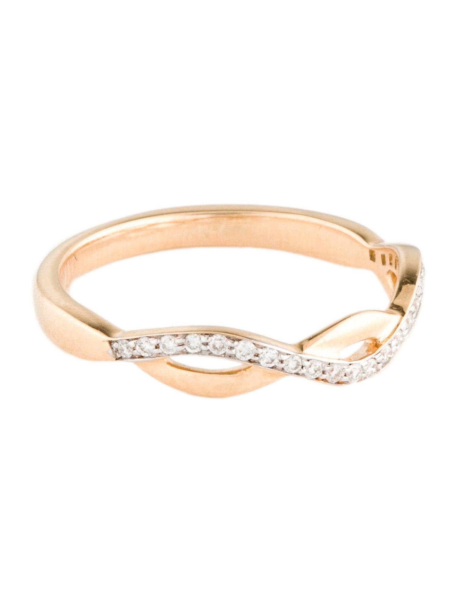 Elevate your jewelry collection with our captivating 14K Yellow Gold Diamond Wave Band Ring, a masterpiece of design and craftsmanship. Sized at 6.75, this ring features a unique wave pattern, enhanced with rhodium-plating for a striking contrast.