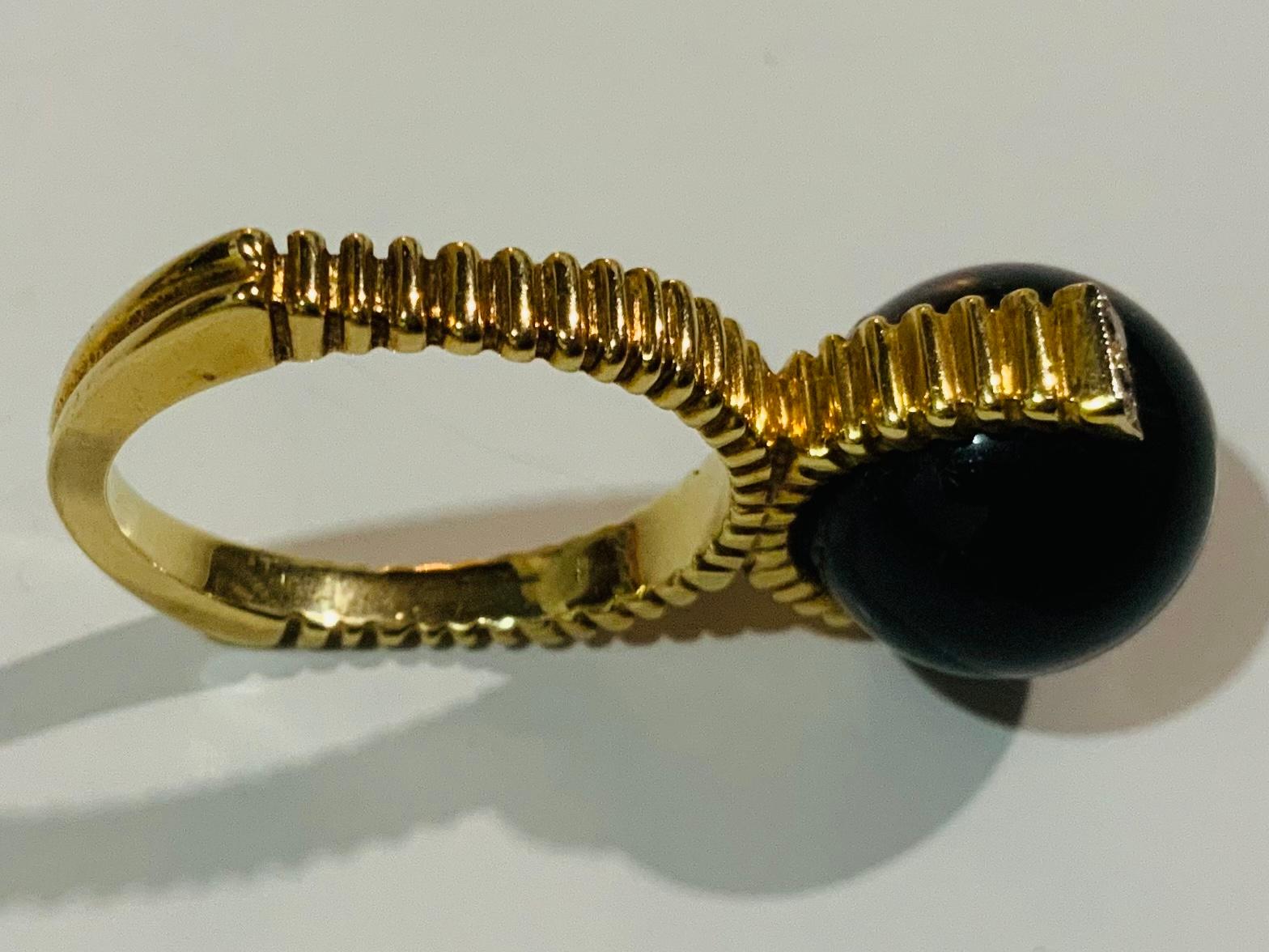 Modern 14K Yellow Gold Diamonds And Black Stone Ring For Sale