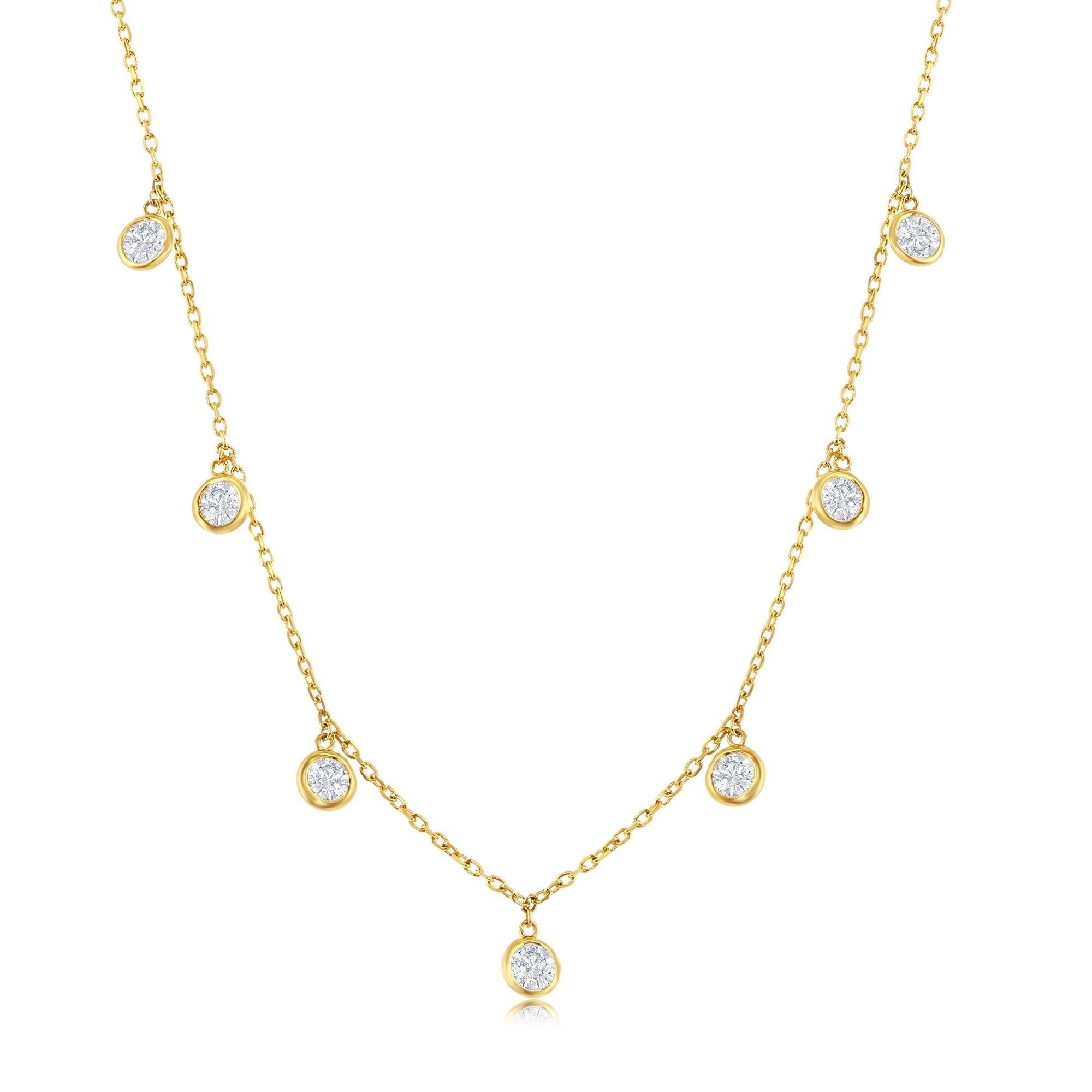 14K Yellow Gold Diamonds by the Yard Chain with 7 Dangle Natural Diamonds.
Classic Diamonds by the Yard Necklace/Chain with a special twist…All 7 Diamonds are Dangling.
Natural Full Cut Diamonds 
14K Yellow Gold
Number of Diamonds: 7
Total Diamonds