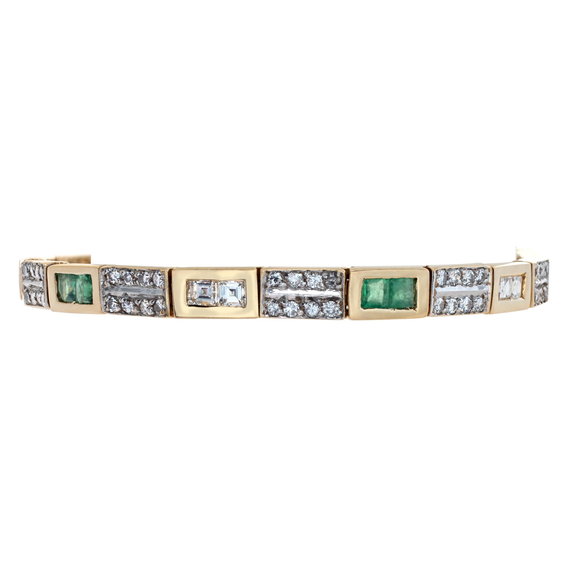 Diamonds & Emerald bracelet set in 14k yellow gold. Round brilliant cut diamonds total approx. weight: 1.00 carat, estimate G-H color, VS-SI clarity. Square cut emerald total approx. weight: 2.00 carats. Fits up to 6.5 inch wrist.
