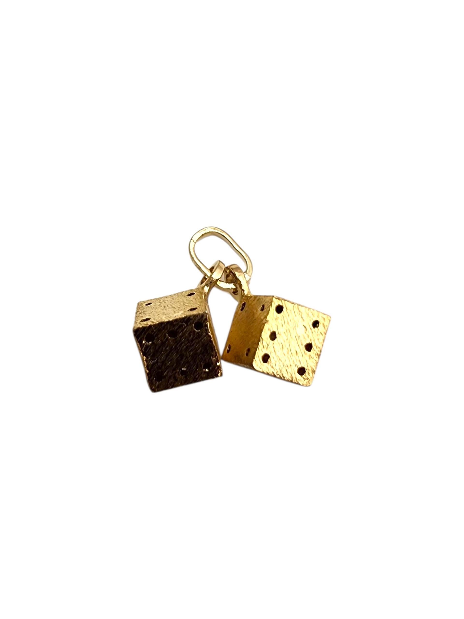 14K Yellow Gold Dice Charm -

This 14K yellow gold dice charm brings a playful touch of luck and style to any jewelry collection. Featuring a polished finish and precise detailing, it’s a fun and unique accessory—perfect for game lovers or anyone