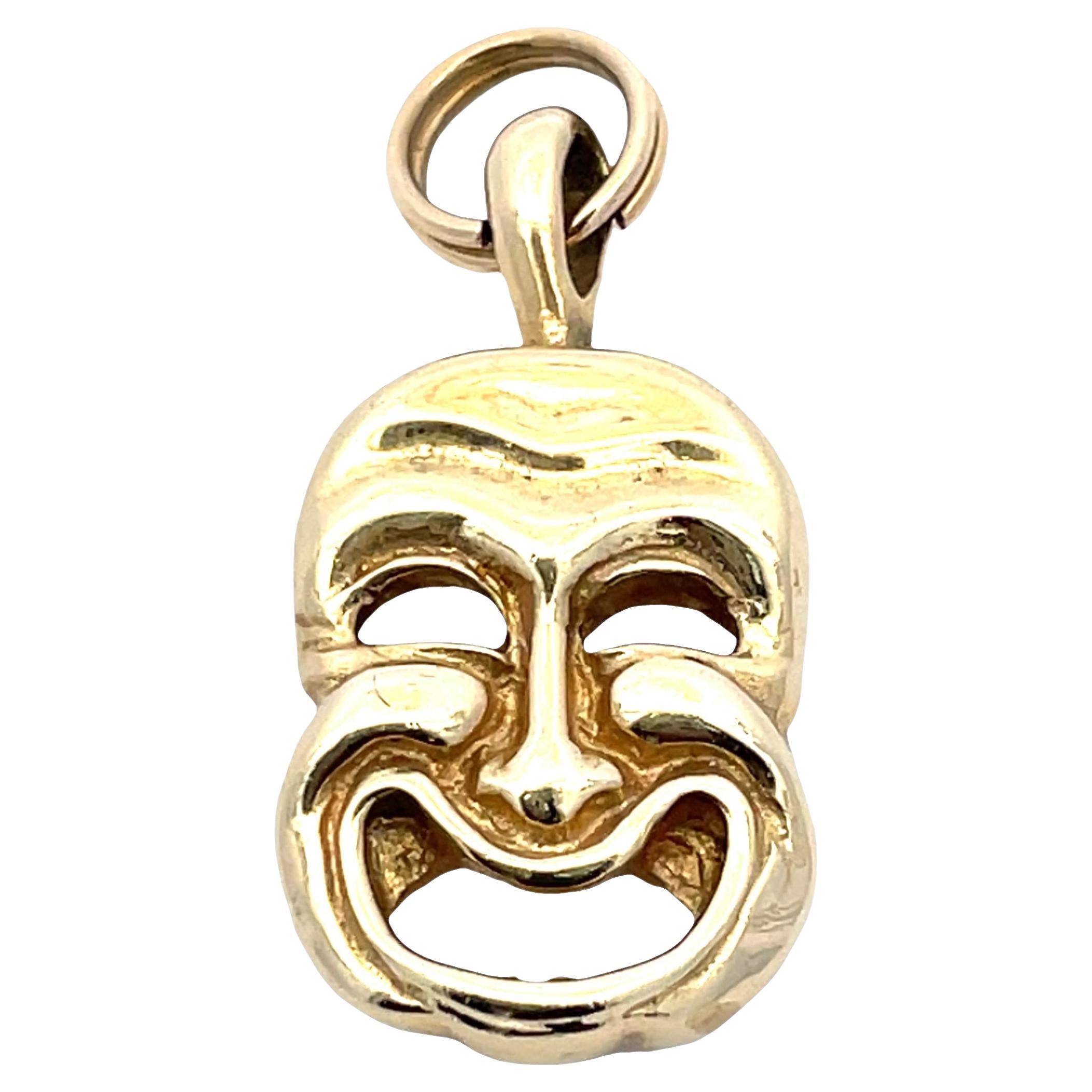 Colgante de oro amarillo de 14 quilates con máscara facial de doble cara en venta