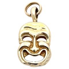 Pendentif masque de visage double face en or jaune 14K