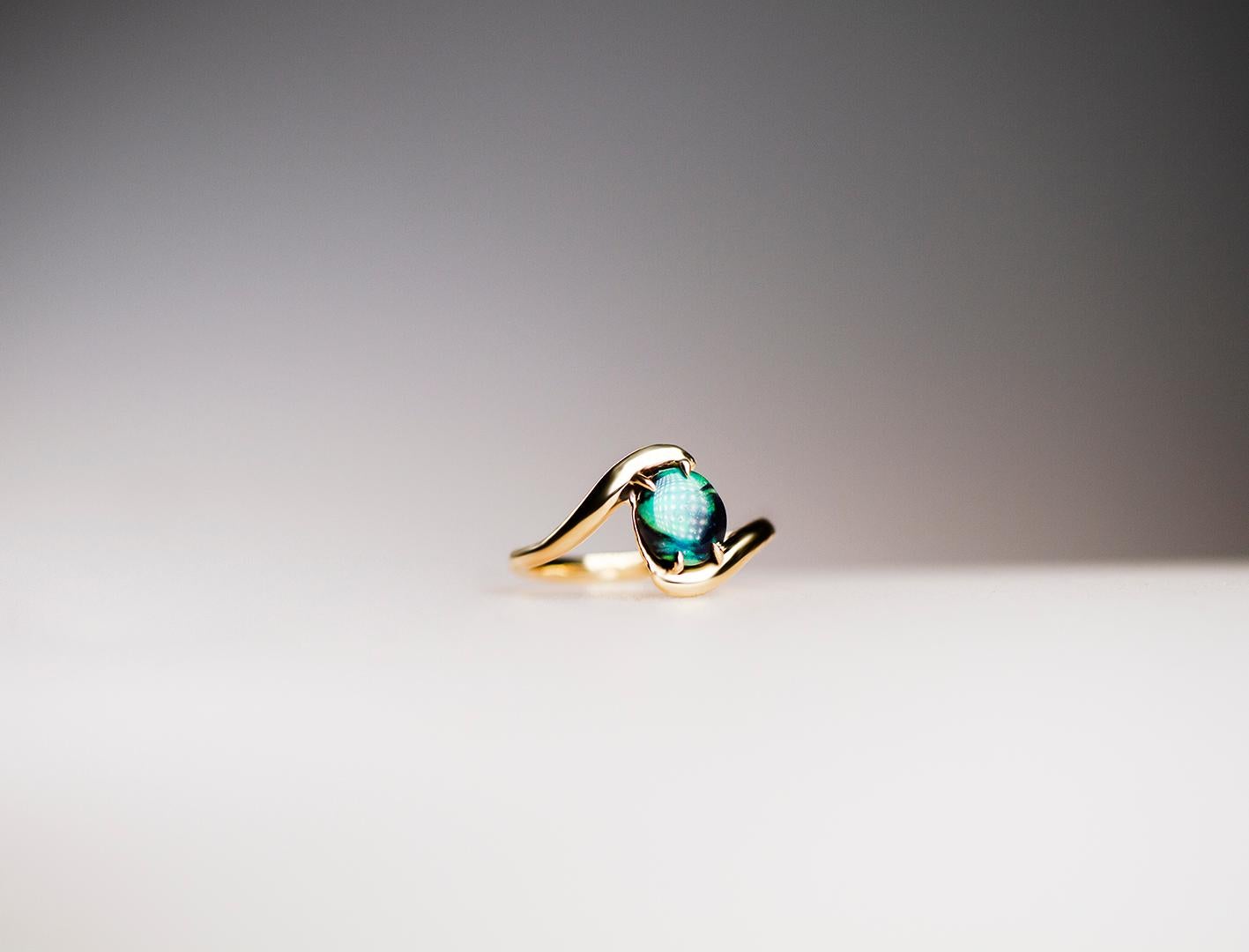 D.O.W. OOAK Opal Ring by St Desiderata

Modeled in wax and made in solid 14k yellow gold and OOAK opal ethically sourced and cut by Ancients17.
OOAK Opal ring inspired in oceanic textures, this is the DOW, for Deep Ocean Water, the name inspired by