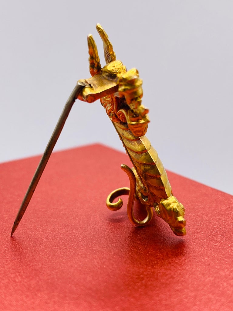 Antique 14k yellow gold dragon pin brooch with cabochon cut ruby eye. Dwt 3.7