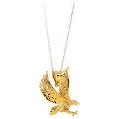 Collier pendentif aigle en or jaune 14 carats