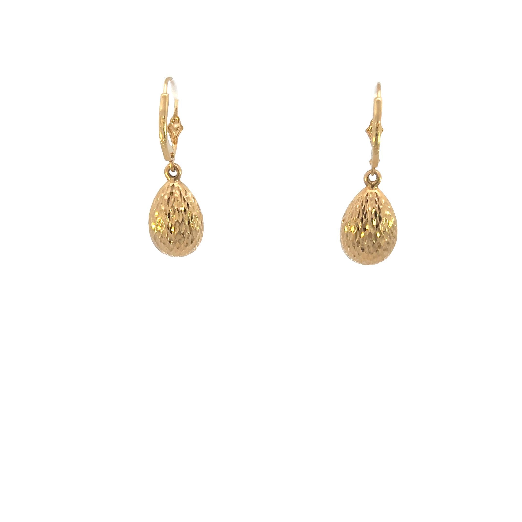 14k yellow gold earrings weighing 1.93 grams:

Material: The earrings are made of 14-karat yellow gold. The 
