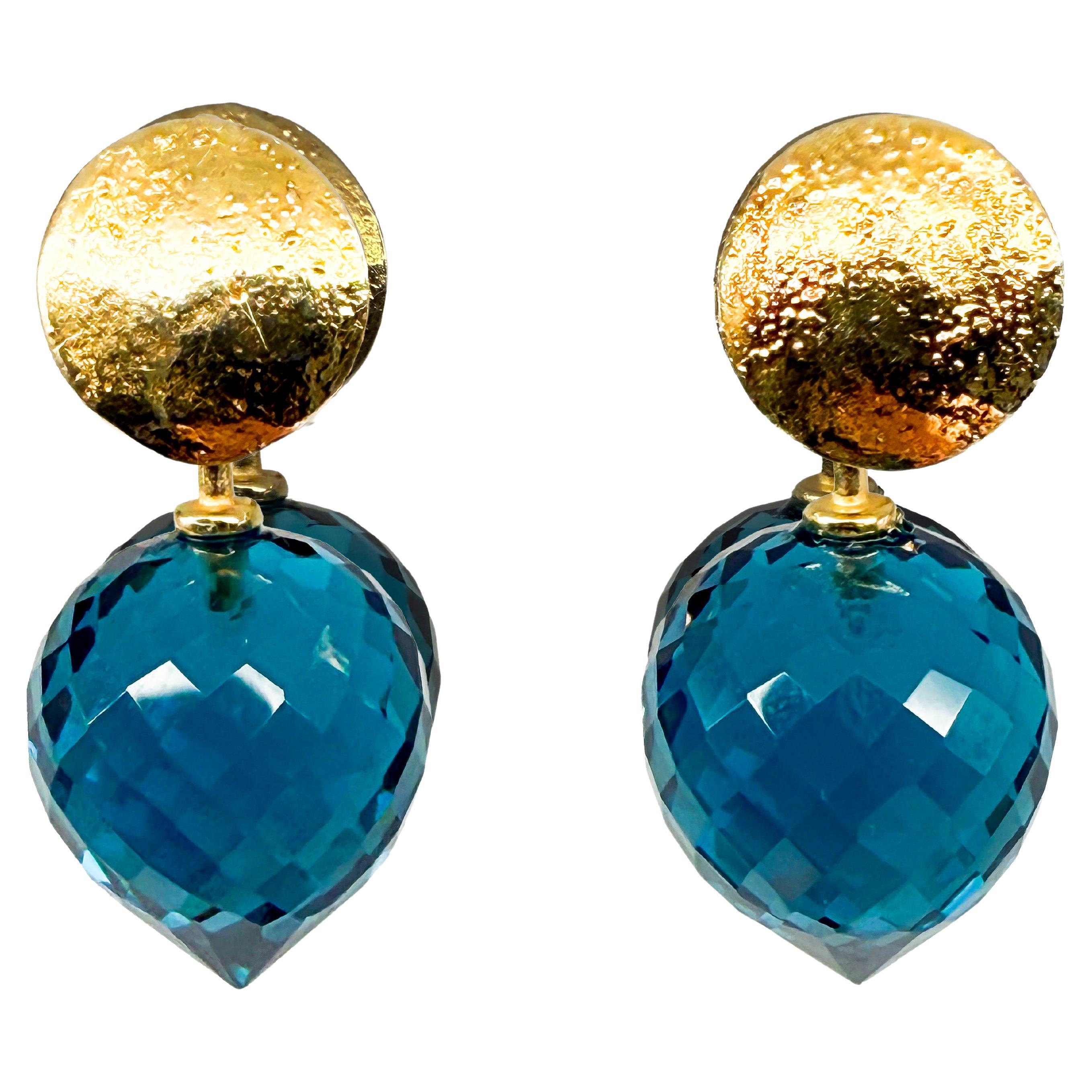 14K yellow gold earrings with blue topaz