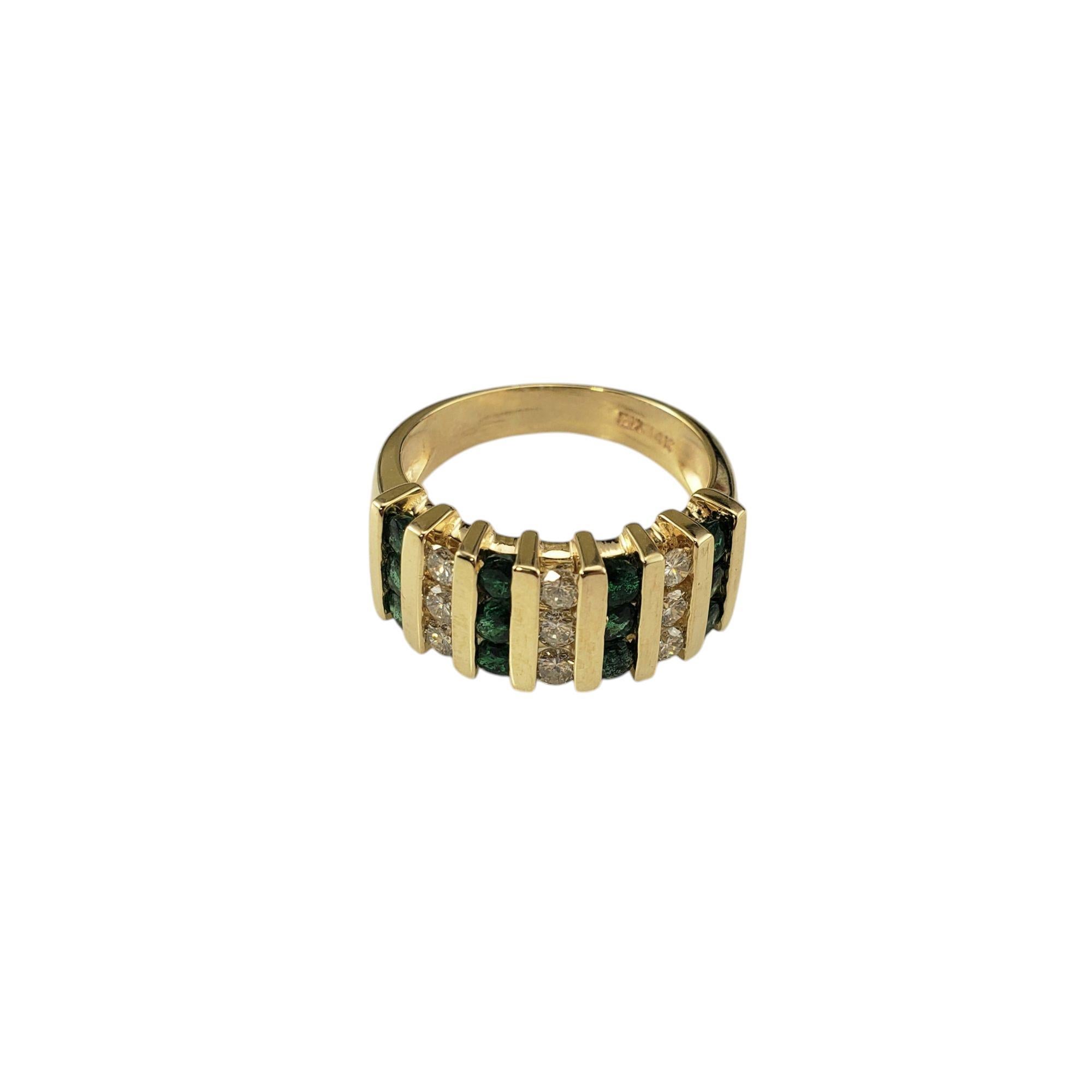 14 Karat Yellow Gold Emerald and Diamond Band Ring Size 7.25 JAGi Certified-

This stunning band features 12 round natural emeralds and nine round brilliant cut diamonds channel set in 14K yellow gold, creating a sleek modern look. 

Width: 9 mm.