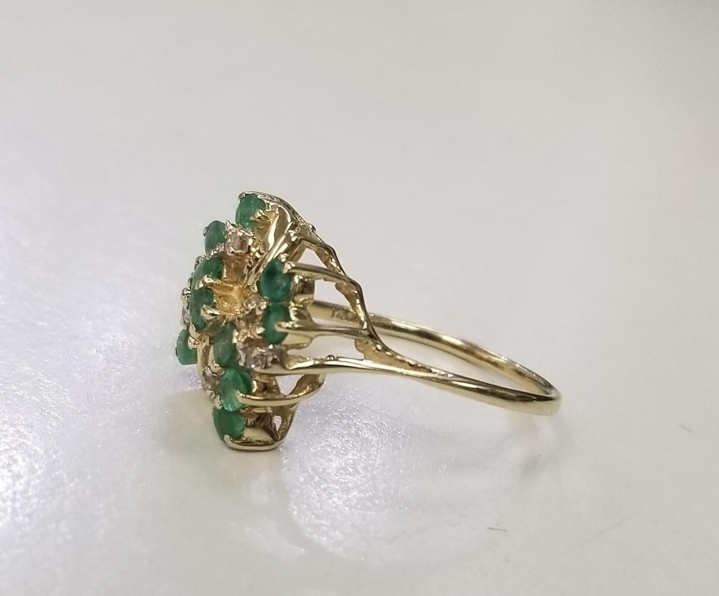 Specifications:
    main stone: 12 round emeralds .50pts.
    other stones: 6 round emeralds .12pts.    
    color:GH
    clarity:SI3-I1
    brand:-  metal:14K GOLD
    type: ring
    weight:3.8Gr
    size:8 US



