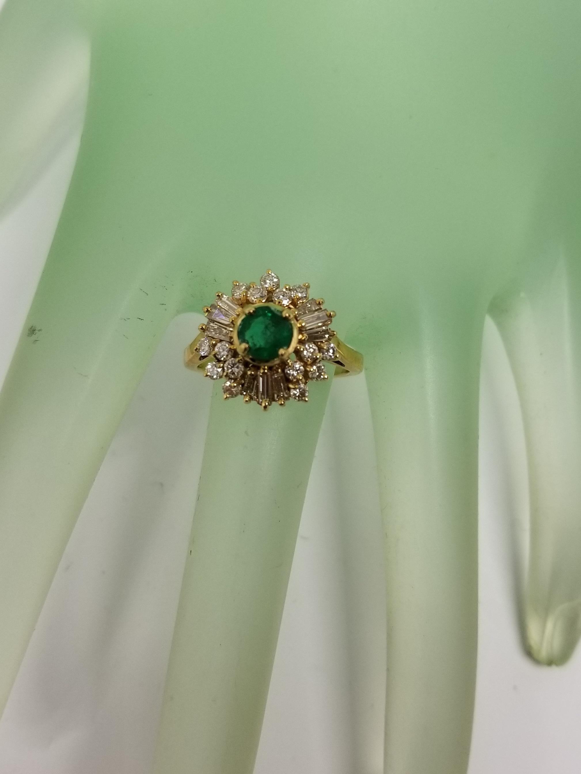 Women's 14 Karat Yellow Gold Emerald and Diamond Cluster Ring For Sale