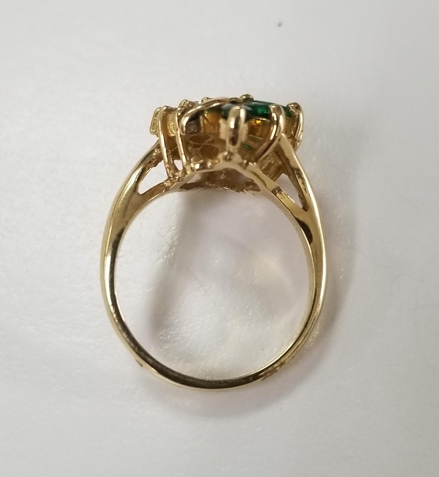 14 Karat Yellow Gold Emerald and Diamond Cluster Ring In New Condition In Los Angeles, CA