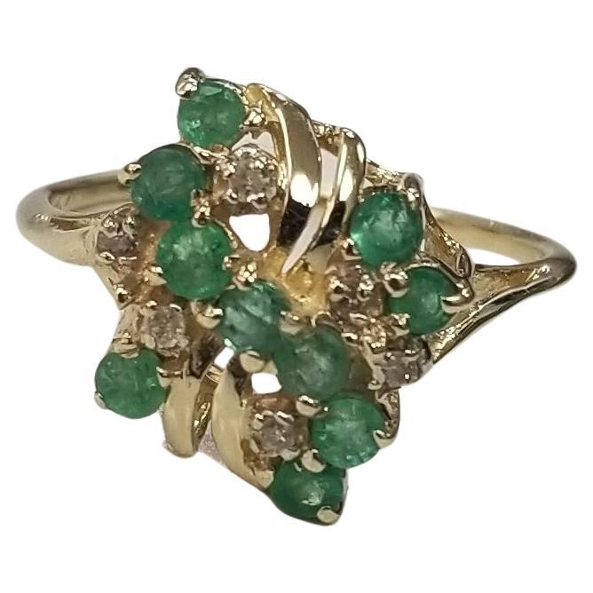14k Yellow Gold Emerald and Diamond Cluster Ring For Sale