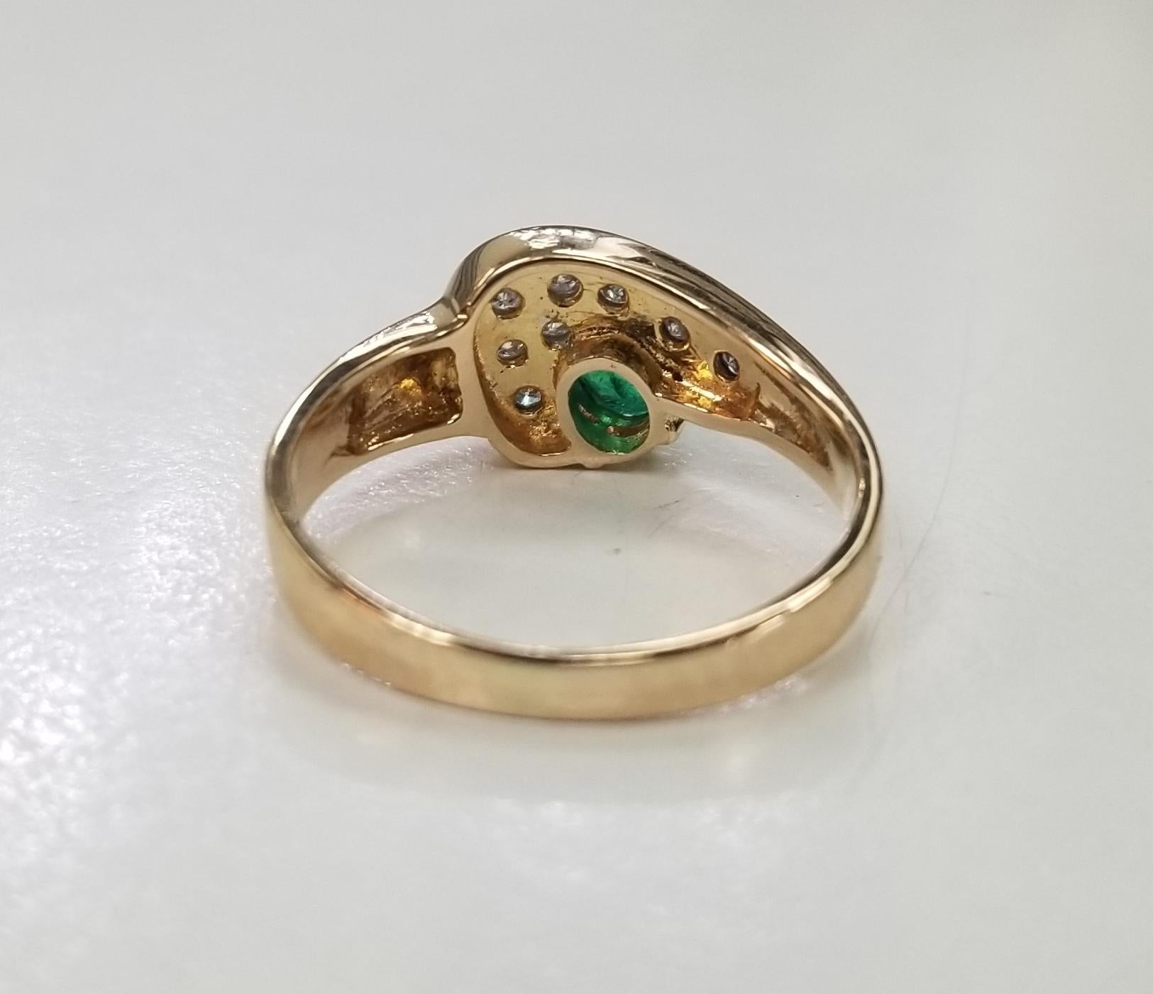 Round Cut 14 Karat Yellow Gold Emerald and Diamond Cocktail Ring For Sale