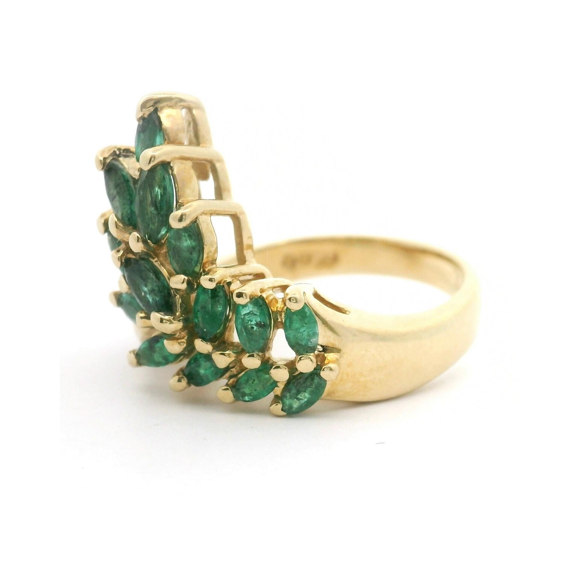 Condition:  Excellent Condition, Professionally Cleaned and Polished
Metal:  14k Gold (Marked, and Professionally Tested)
Weight:  5.5g
Gemstones:  Marquise Cut Emeralds
Diamonds:  Round Cut Natural Diamonds 0.08cttw  
Width:  20mm at face, 3mm at