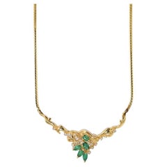 Collana di smeraldi e diamanti in oro giallo 14K 9,3g