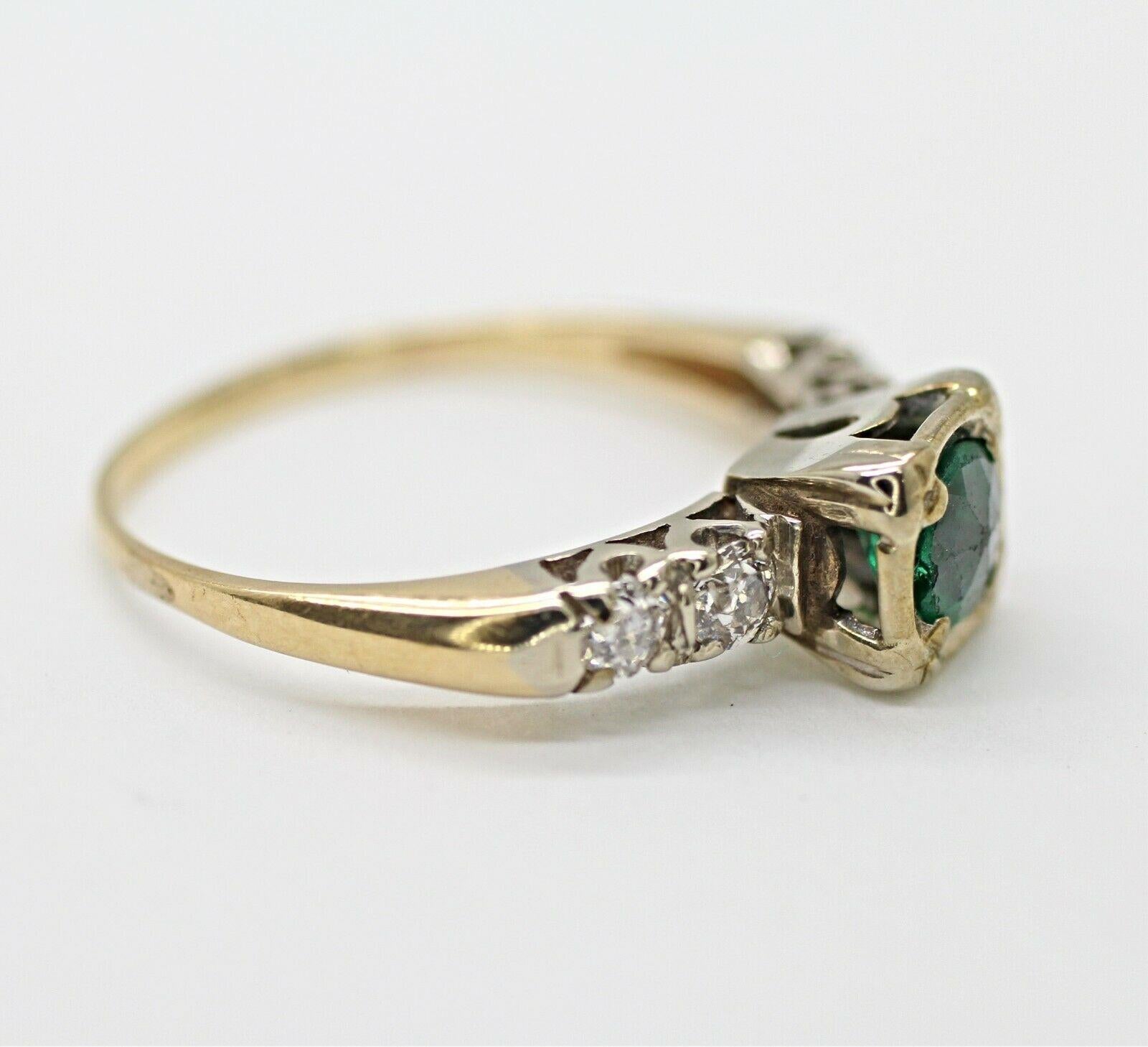 Contemporary 14 Karat Yellow Gold Emerald and Diamond Ring Containing