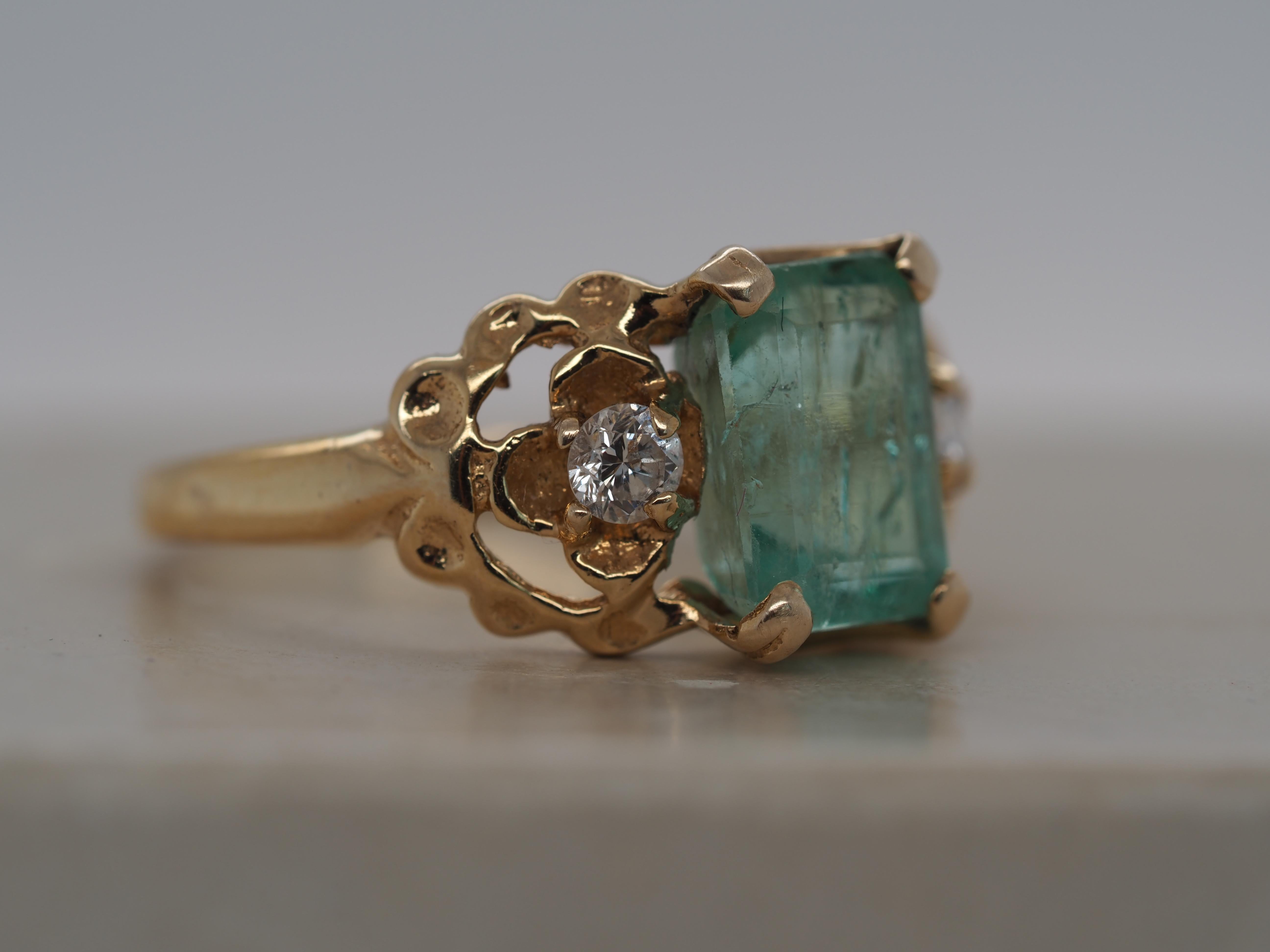 Contemporary 14k Yellow Gold Emerald and Diamond Ring For Sale