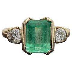14k Yellow Gold Emerald and Diamond Ring