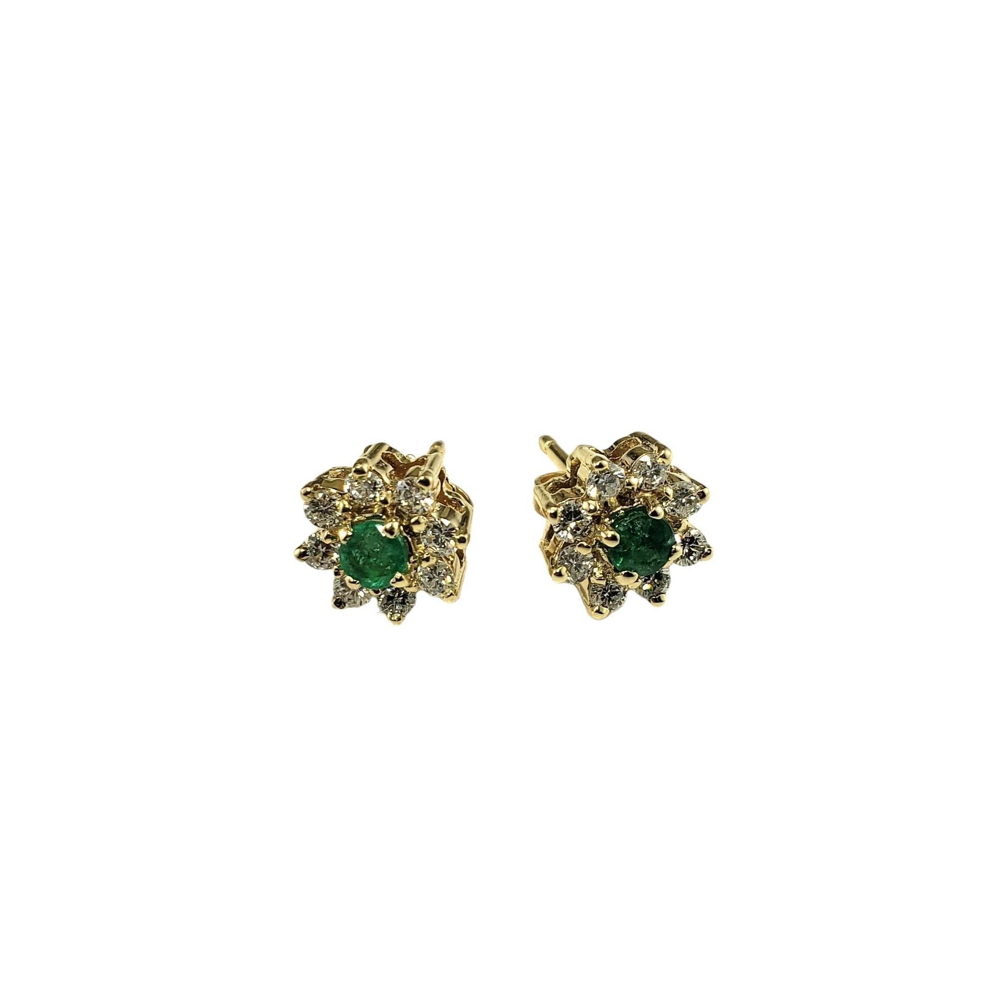 Vintage 14K Yellow Gold Emerald and Diamond Stud Earrings JAGi Certified-

These elegant stud earrings each feature one round emerald and eight round brilliant cut diamonds set in classic 14K yellow gold.  Push back closures.

Total emerald weight: