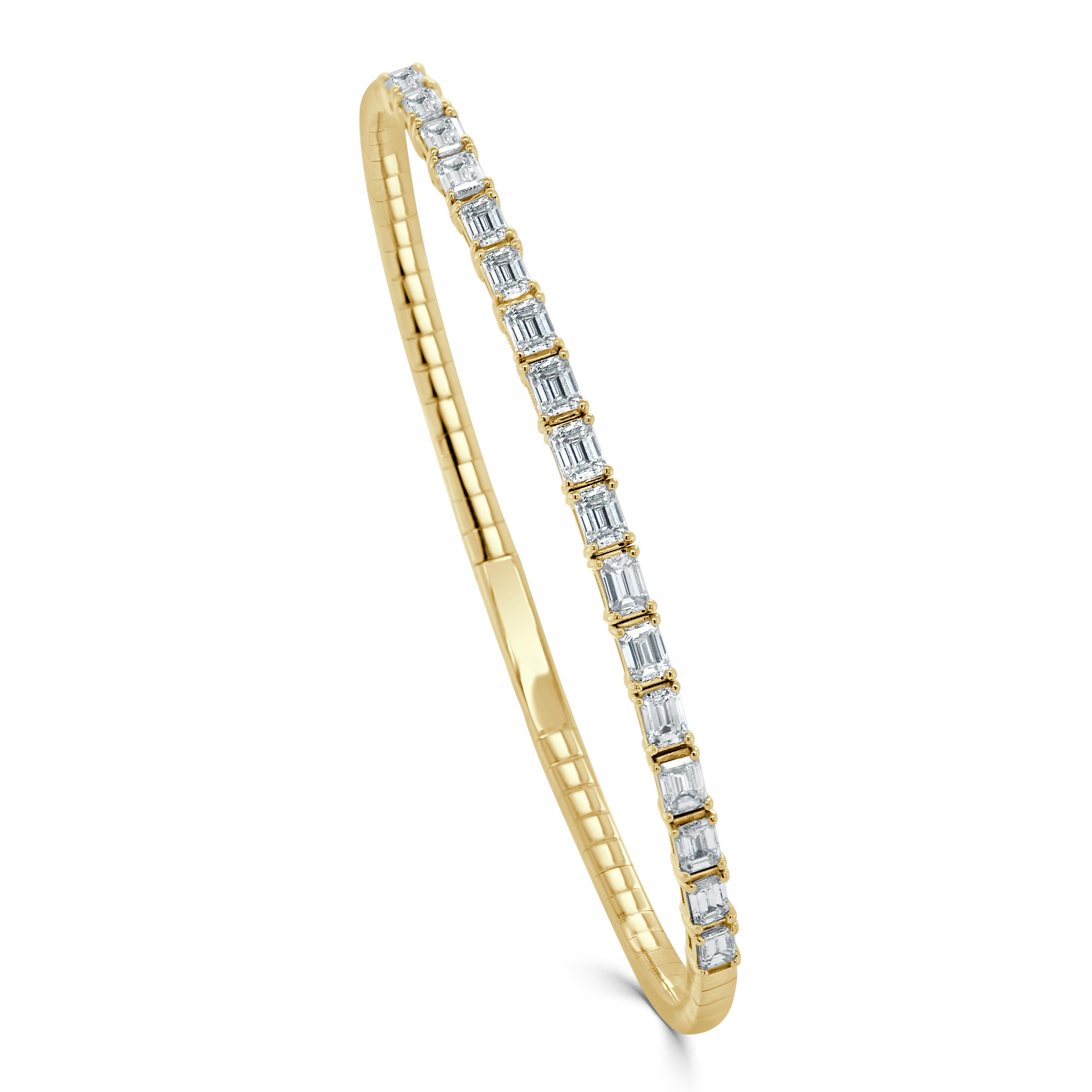 Quality Flexible Bangle: Made from real 14k gold with 17 glittering emerald cut white diamonds approximately 2.26 ct. Certified diamonds, featuring a single row of emerald cut white diamonds flexible diameter for comfort with a color and clarity of