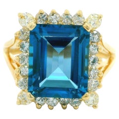 14k Yellow Gold Emerald Cut Blue Topaz w/ 0.44ctw Halo Diamond Cocktail Ring