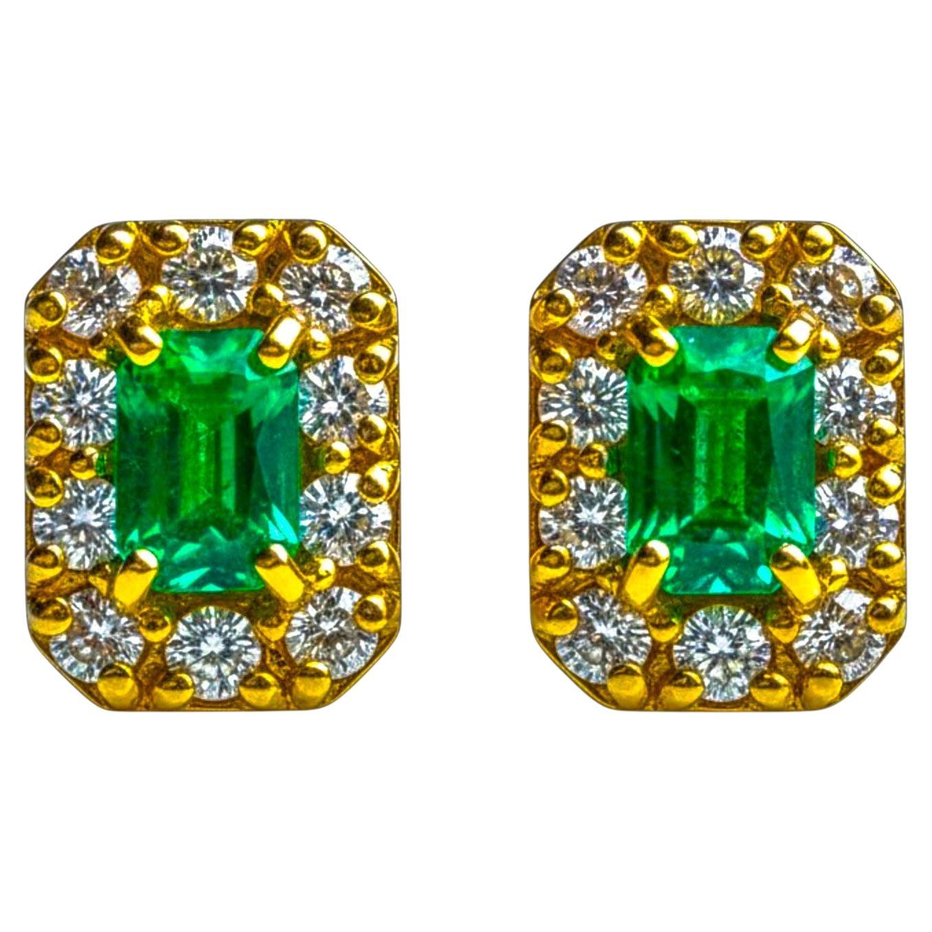 Boucles d
oreilles Halo en or jaune 14K avec émeraude de Colombie taillée