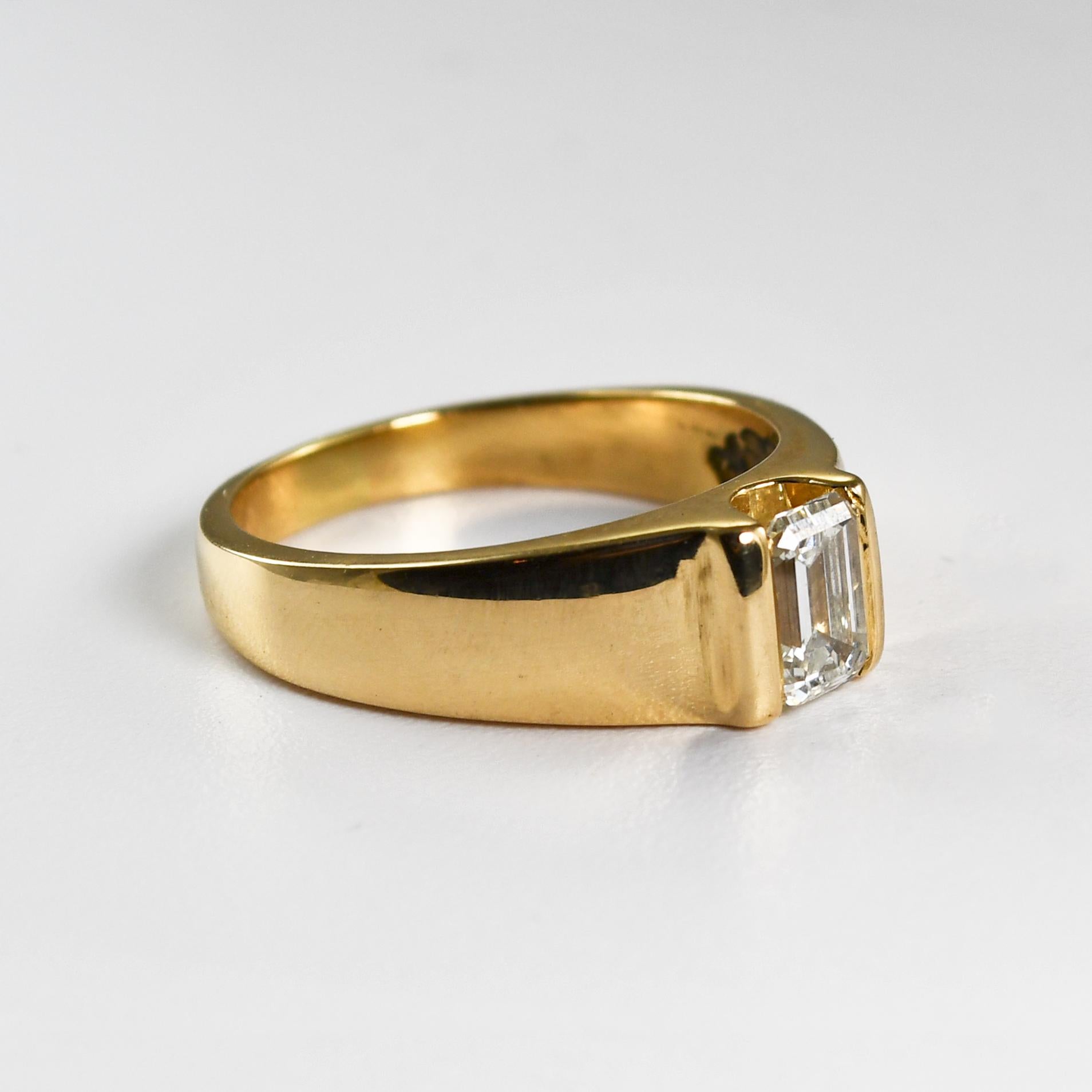 Ladies 14k yellow gold and diamond engagement ring.
Stamped 14k and weighs 5.6 grams gross weight.
The diamond is an emerald cut, .75 carats, G to H color, Vs clarity, excellent length to width ratio.
The top of the ring measures 6.5mm wide.
Ring