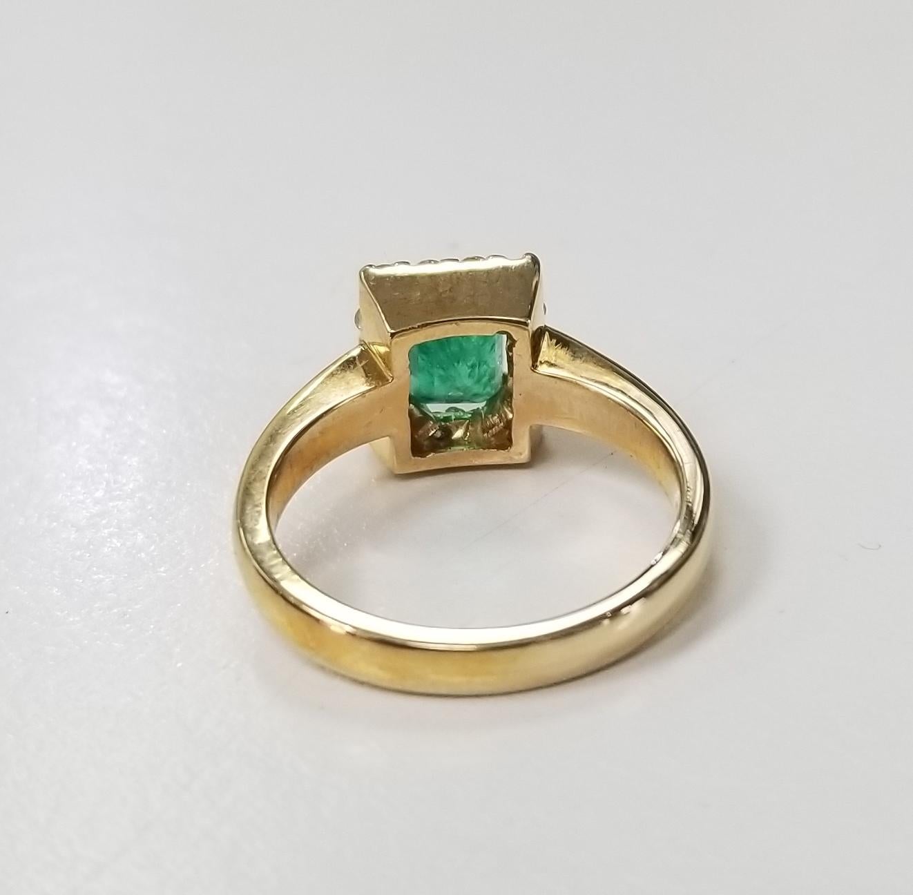 14 Karat Yellow Gold Emerald Cut Emerald and Diamond Ring In New Condition For Sale In Los Angeles, CA