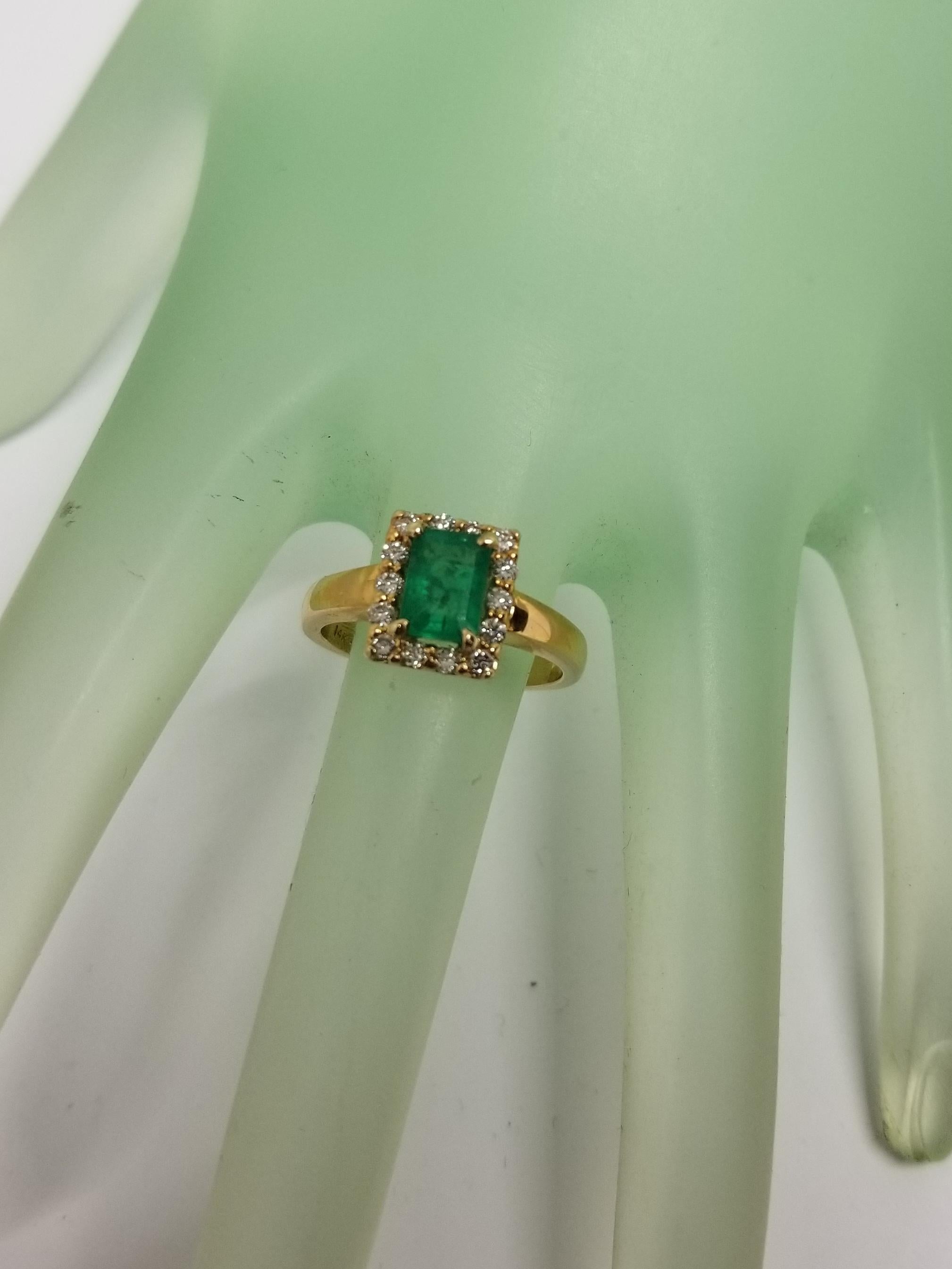 14 Karat Yellow Gold Emerald Cut Emerald and Diamond Ring For Sale 1