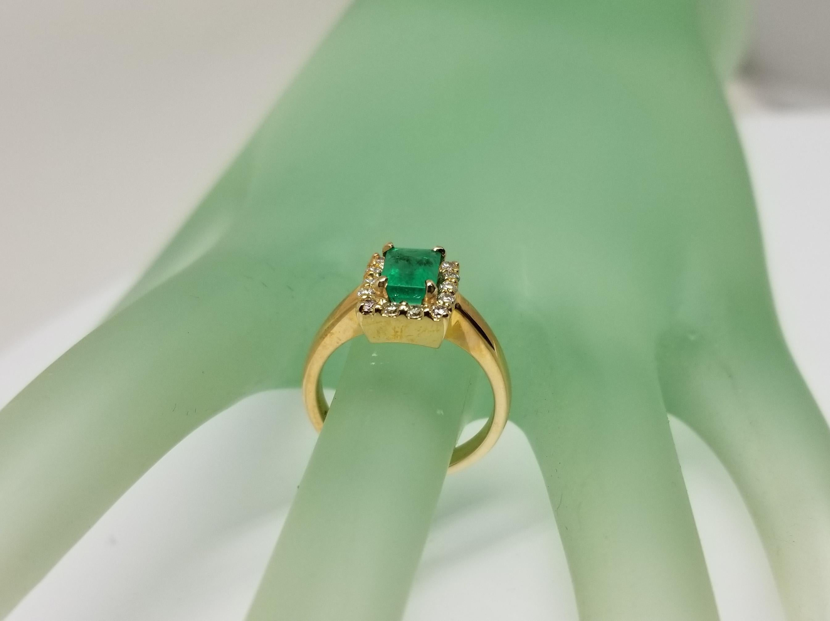 14 Karat Yellow Gold Emerald Cut Emerald and Diamond Ring For Sale 2