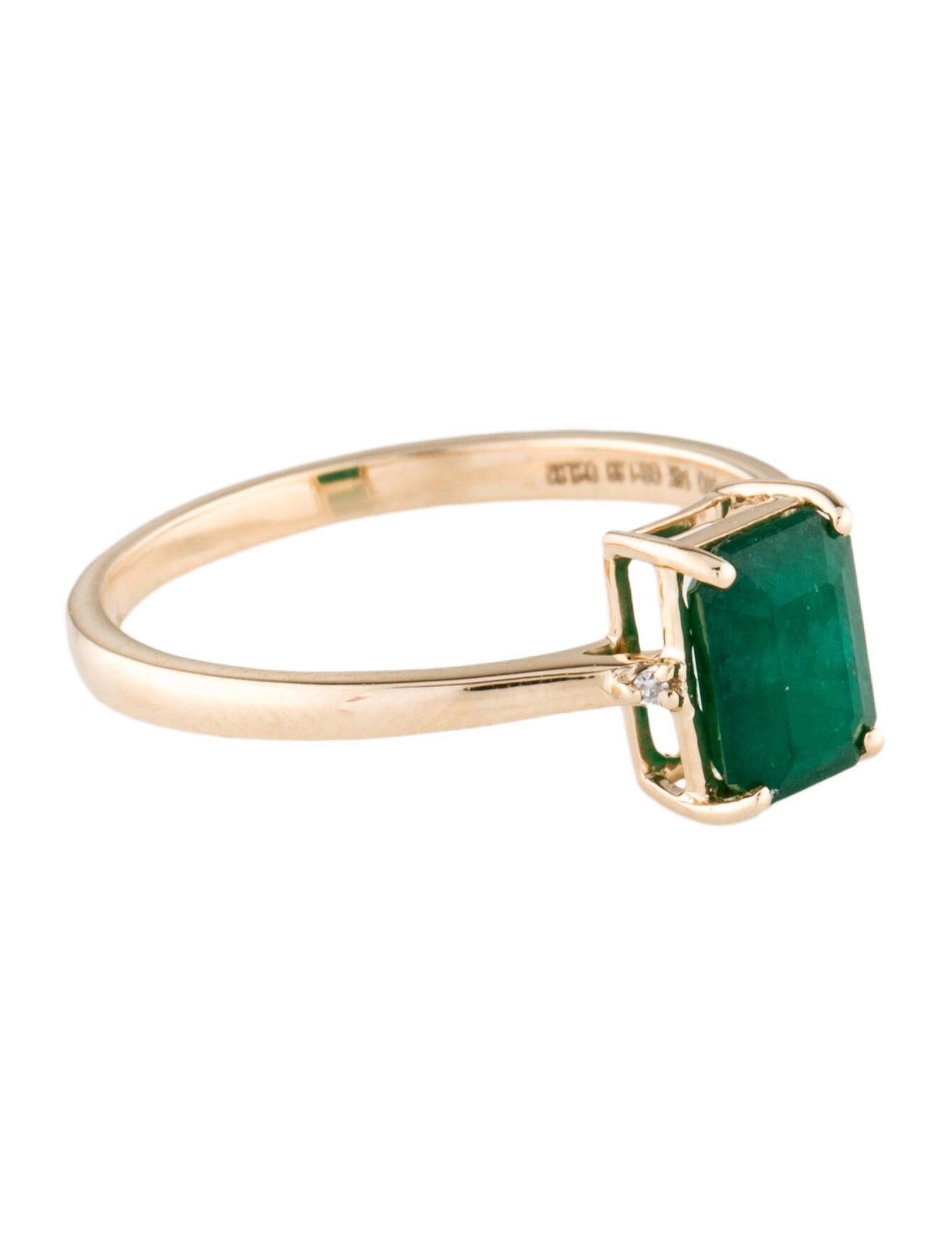 Discover the timeless elegance of our 14K Yellow Gold Cocktail Ring, featuring a magnificent 0.86 carat Emerald Cut Emerald, complemented by two near colorless, single-cut diamonds. This exquisite piece is a testament to refined craftsmanship and
