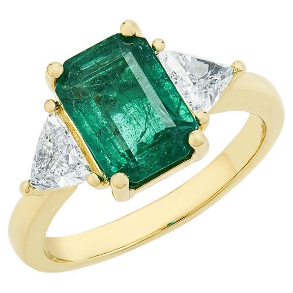 For Sale:  14K Yellow Gold, Emerald Cut Emerald w/ Trillion Diamond Sides Ring