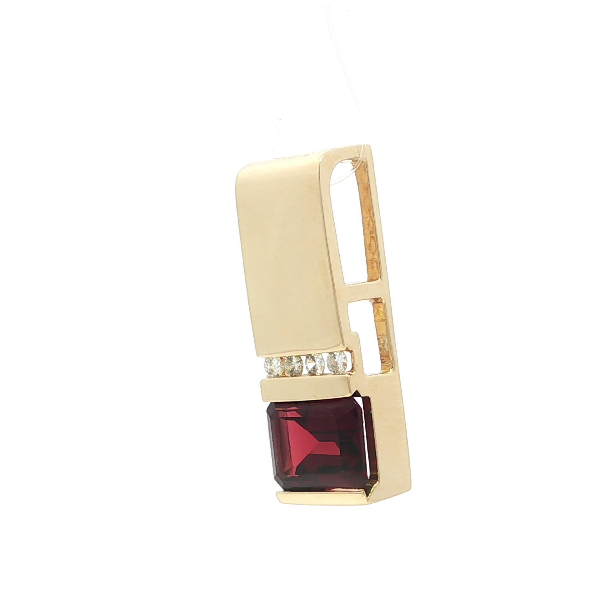 –Stone(s)–
(1) Natural Genuine Garnet - Emerald Cut - Channel Set - Deep Orangy Red Color - 10.2x7.5mm (approx.)
(4) Natural Genuine Diamonds - Round Brilliant Cut -Channel Set - Nice Brilliant White Diamonds - 0.12ctw approx.)

Material: Solid 14k