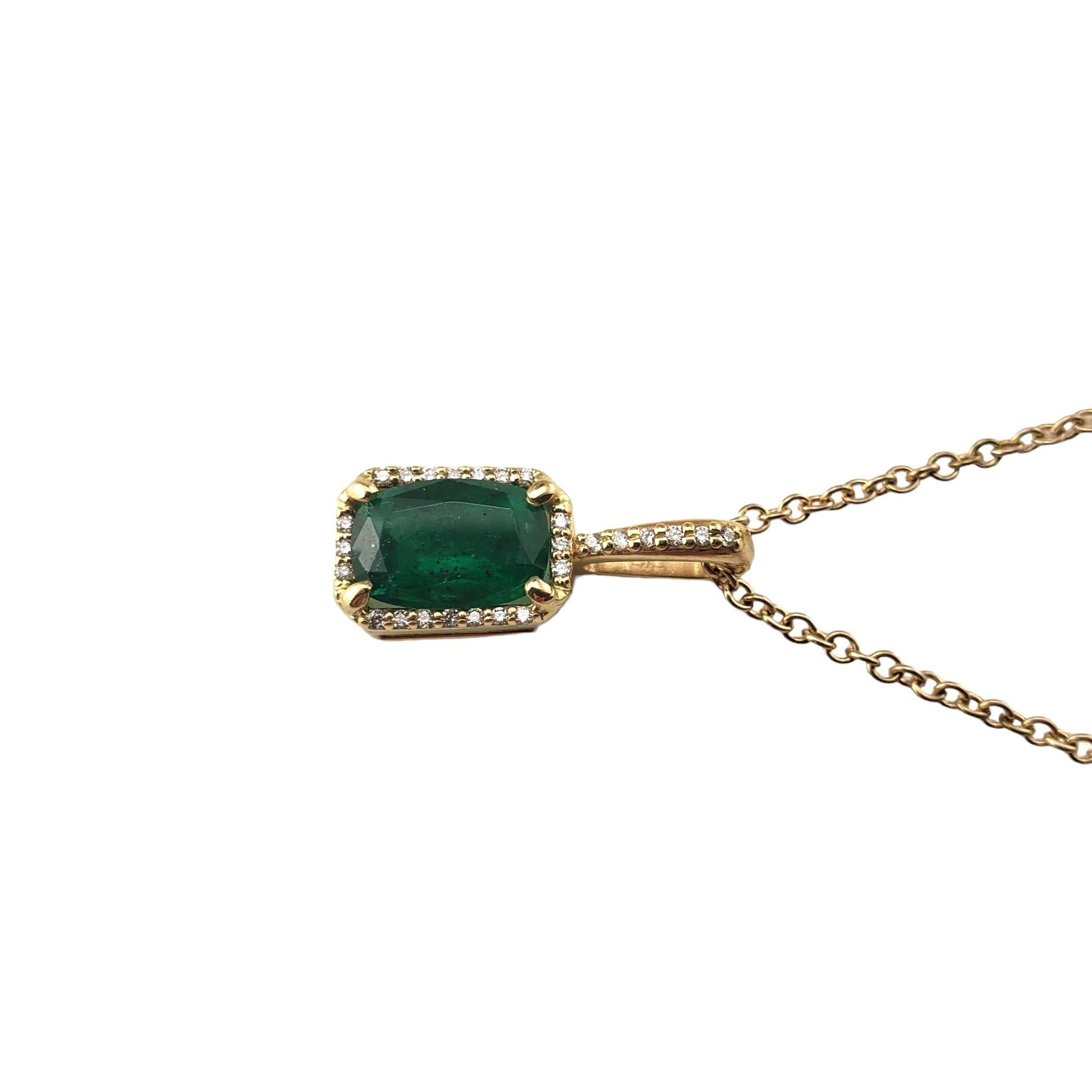 Vintage 14K Yellow Gold Emerald and Diamond Pendant Necklace-

This elegant pendant necklace features one oval cut natural emerald (8.7 mm x 6.0 mm) and 26 round brilliant cut diamonds set in classic 14K yellow gold.

Emerald weight:  1.20