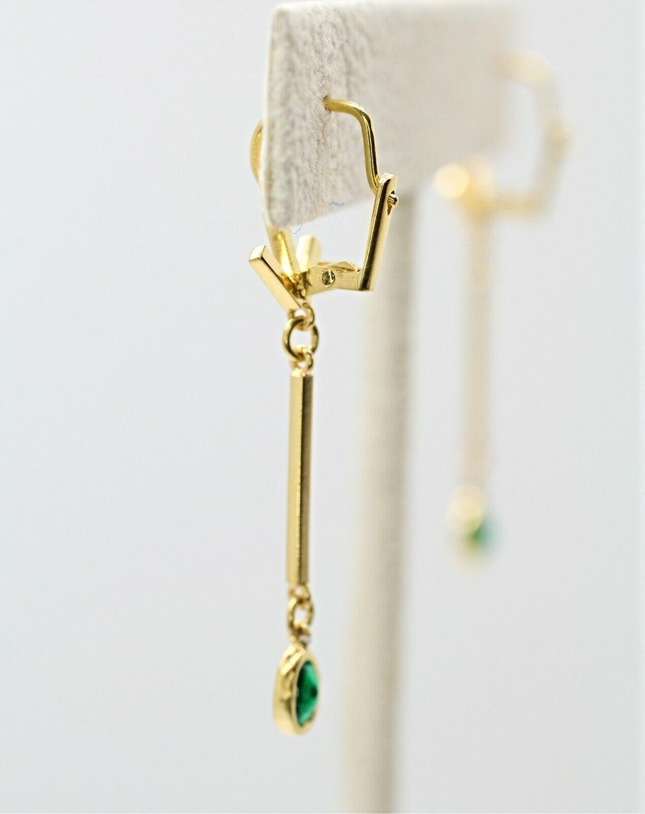 Contemporary 14 Karat Yellow Gold Emerald Drop Earrings