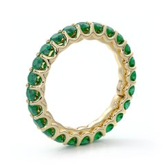 14 Karat Gold Emerald Eternal Fit Eternity Band Features 2.53 Carat of Green