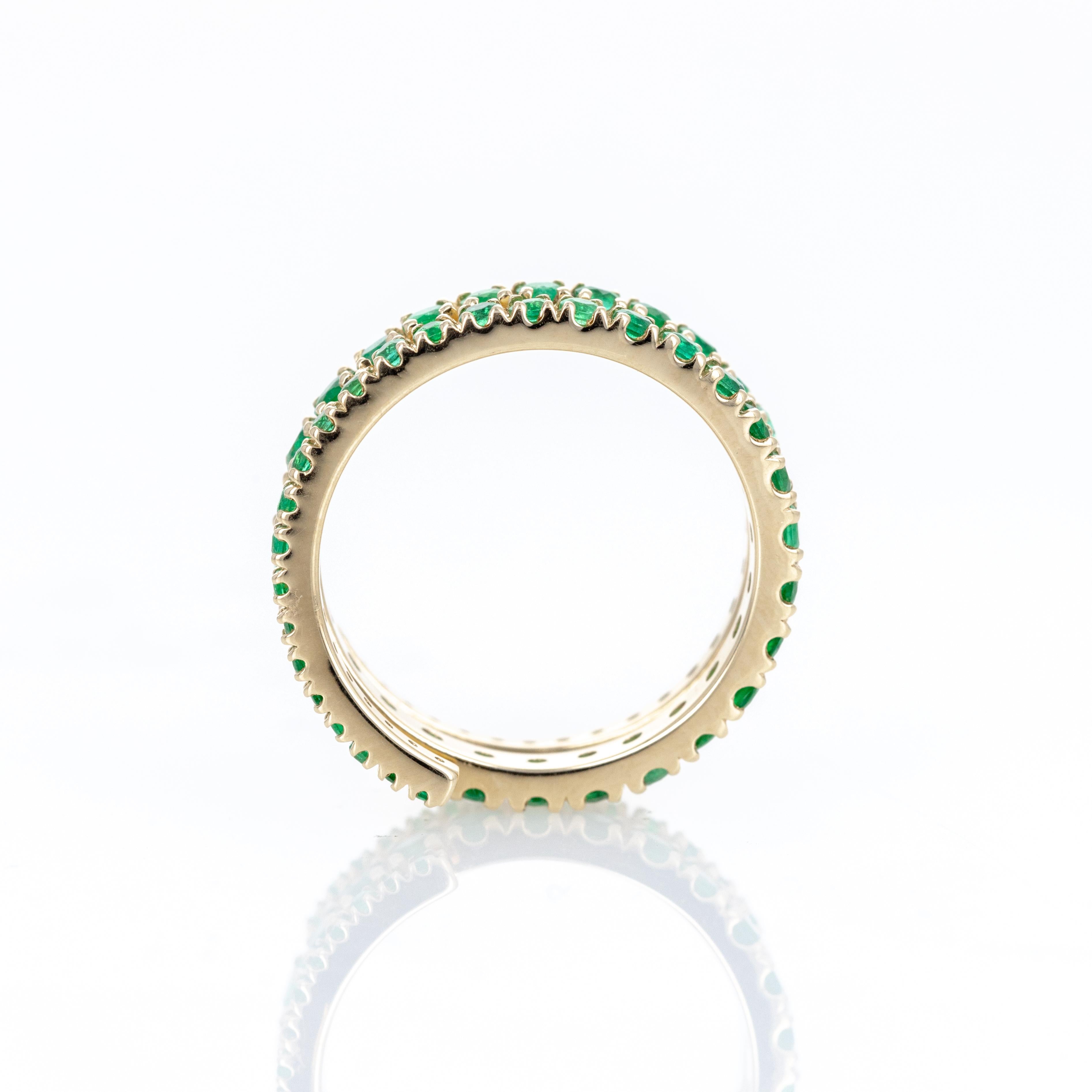 Era: New
Composition: 14K Yellow Gold
Primary Stone: Sixty-Seven Round Natural Emeralds
Total Carat Weight: 1.54 Carats
Ring Size: 6.5
Ring Width: 8mm
Ring Weight: 4.0 Grams
Item Barcode: 247824