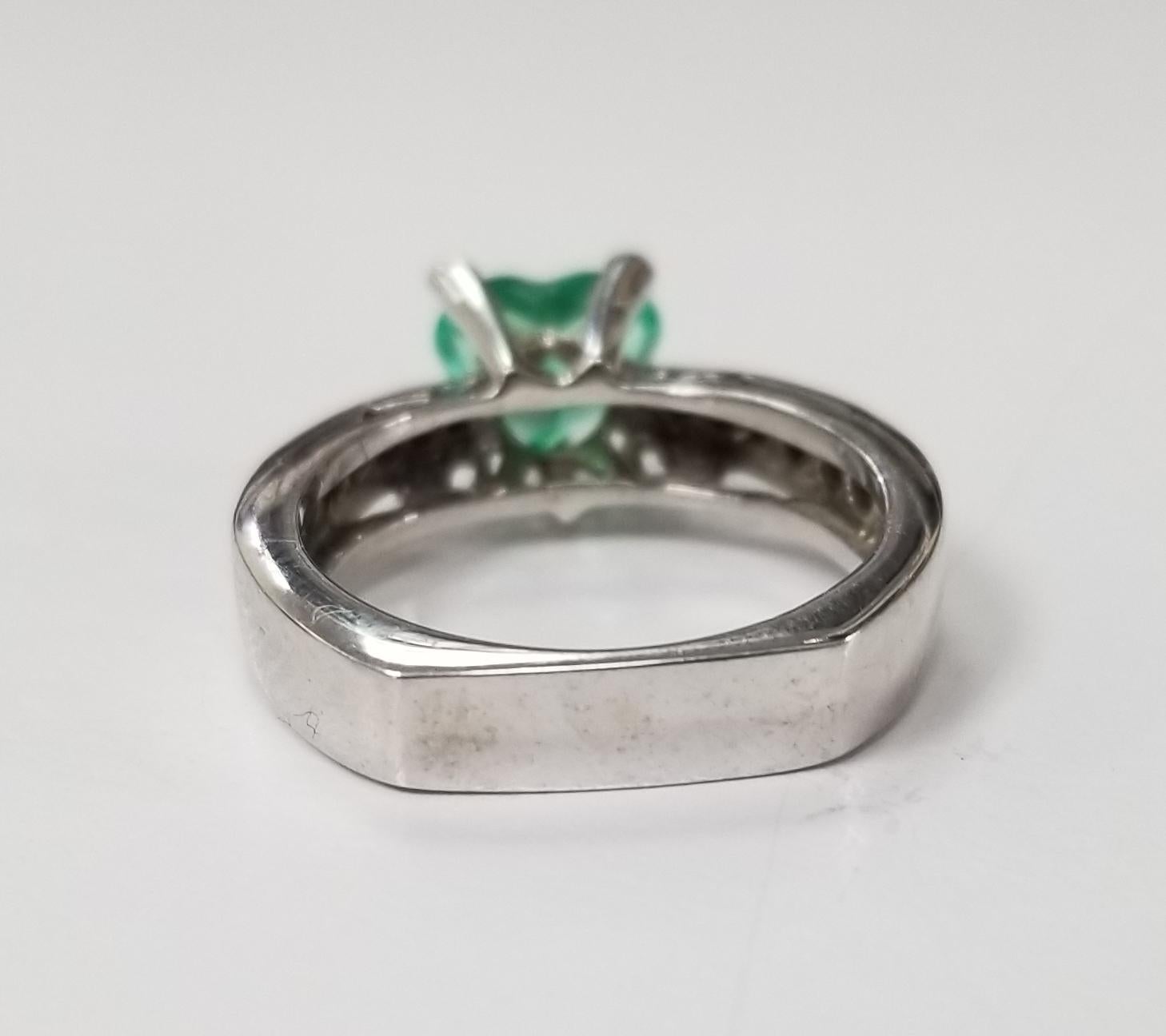 emerald heart ring with diamonds