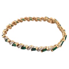 14K Gelbgold Smaragd Marquise 2,85ct und Diamant 0,095ct Tennisarmband