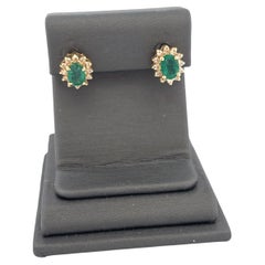 14K Yellow Gold Emerald Oval Stud Earrings with Diamond Halo
