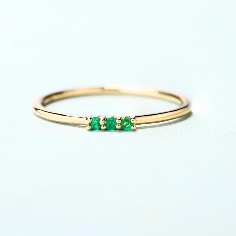 For Sale:  Trilogy Round Emerald 14K Yellow Gold Ring 4
