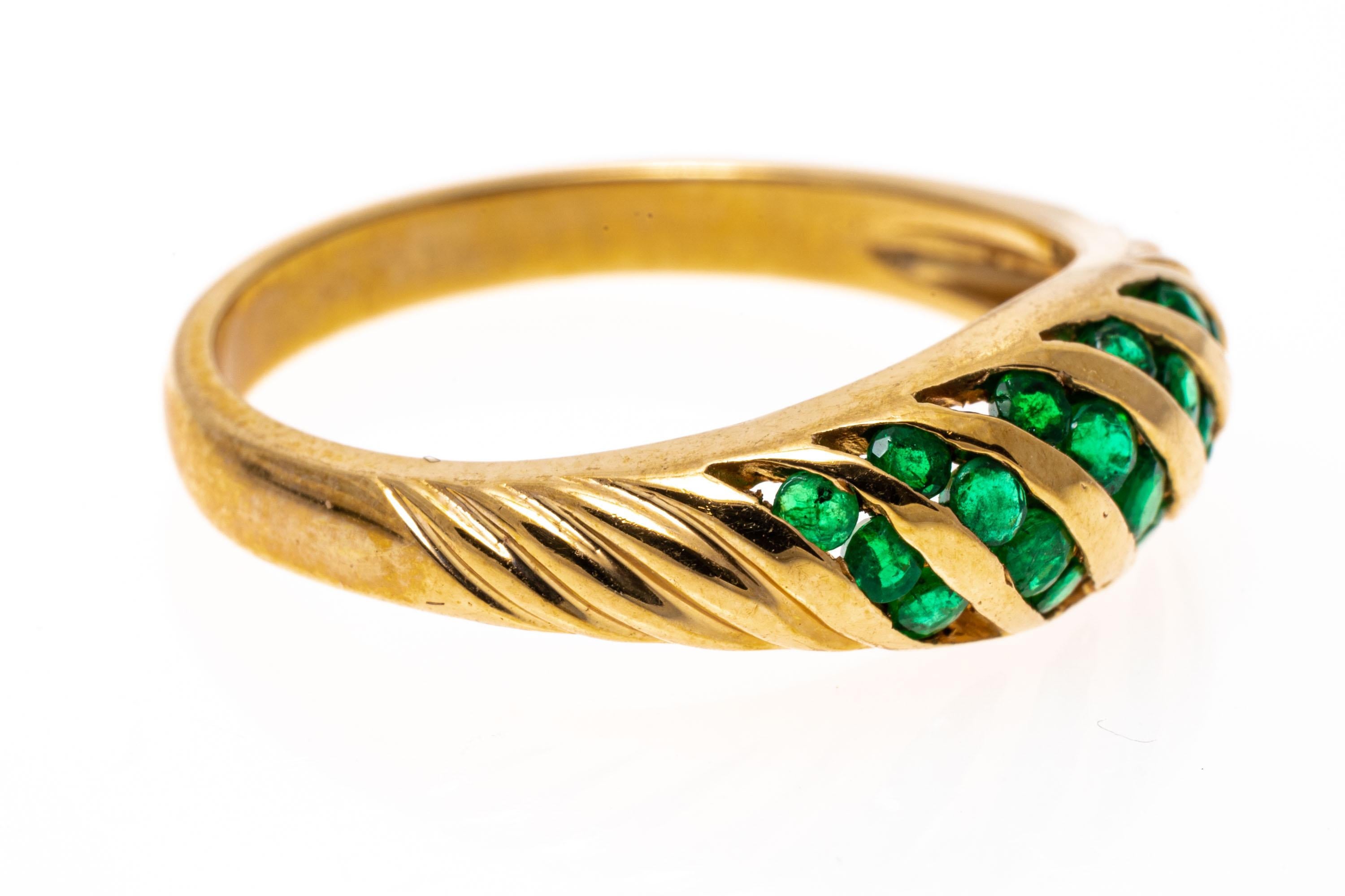 Contemporary 14k Yellow Gold Emerald Set Ribbed Dome Ring, App. 0.40 Tcw For Sale