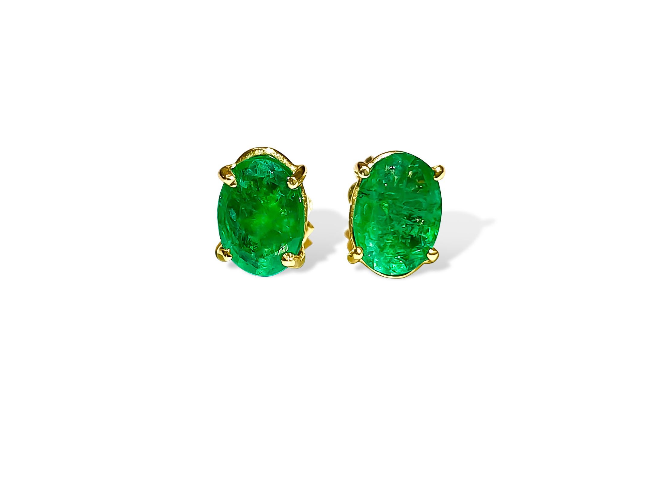 Metal: 14K yellow gold. 
TCW of emeralds: 2.00cts. 
Oval shape set in prongs. 
100% natural earth mined emerald. 
Saturation and color: Excellent. 
Butterfly push back studs. 
Perfect emerald and gold studs for her.

Fashioned from elegant 14K