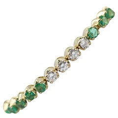 14k Yellow Gold Emeralds and Round Diamonds Tennis Bracelet